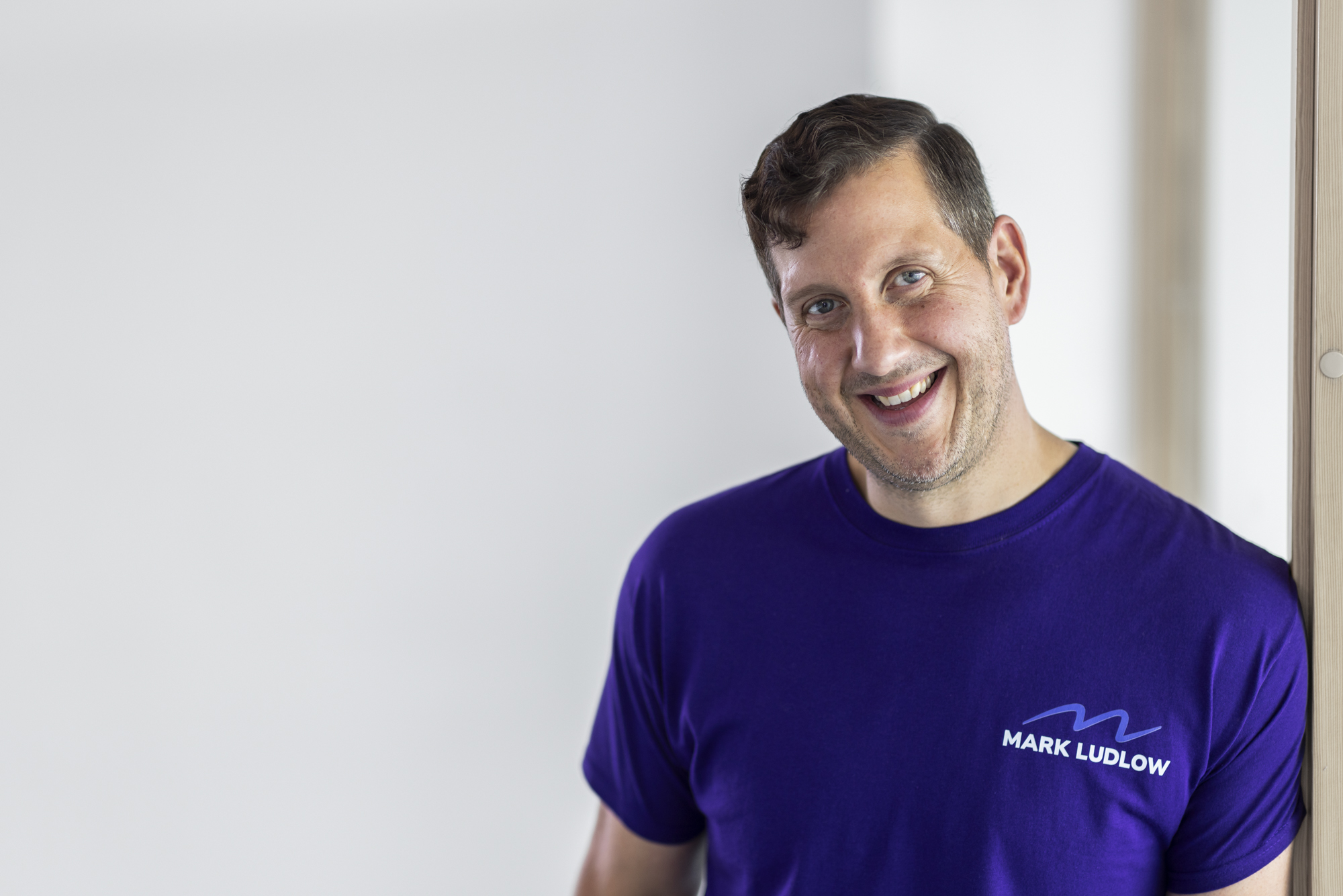 personal training coach supporting a client in Barnet