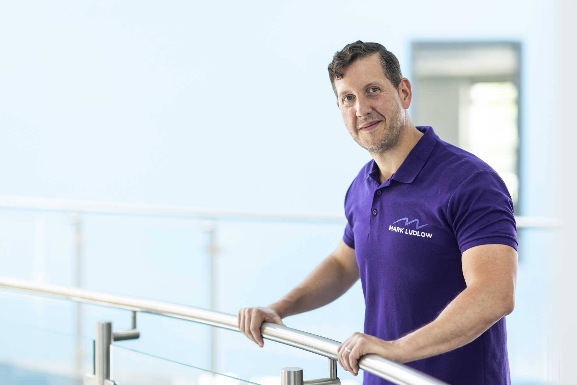 Personal trainer discussing personal training costs with a client